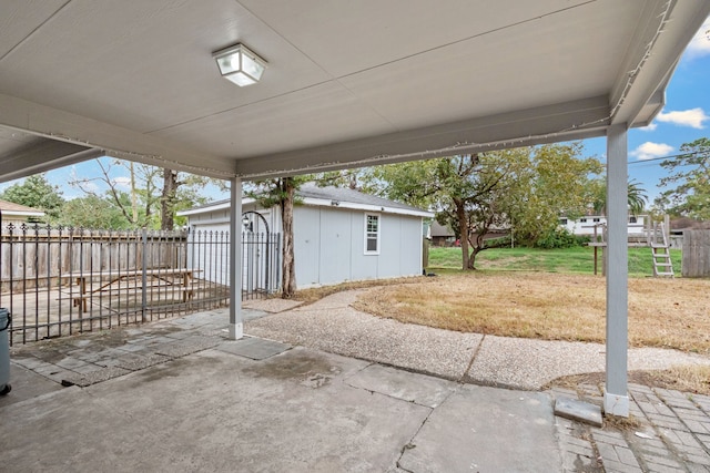 view of patio featuring an outdoor structure