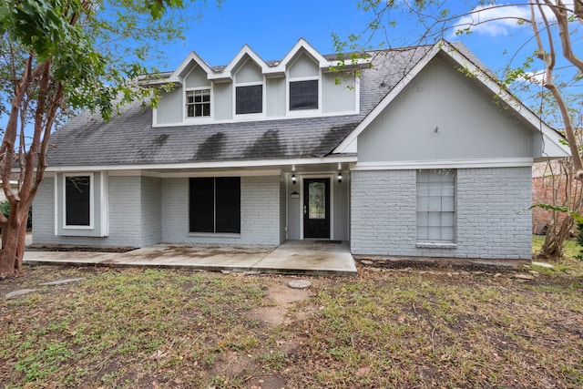 view of front of home with a patio