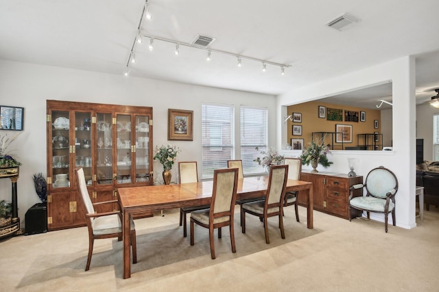 view of carpeted dining room