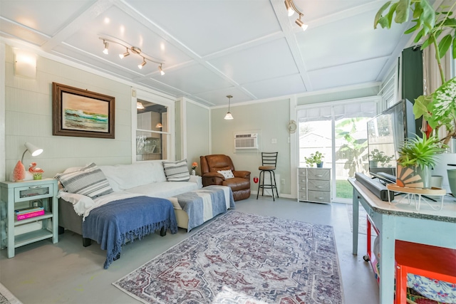 living area with coffered ceiling, concrete floors, and a wall mounted AC