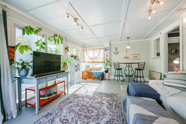 living room with concrete flooring