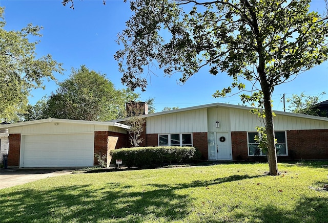 single story home with a front yard and a garage