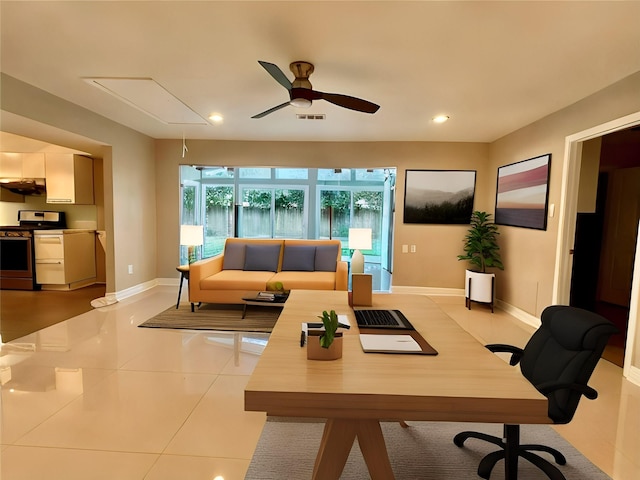 interior space featuring ceiling fan and light tile patterned floors