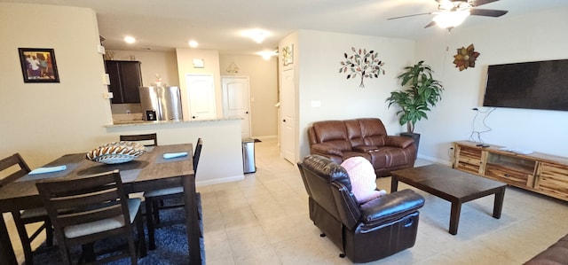 living room with ceiling fan