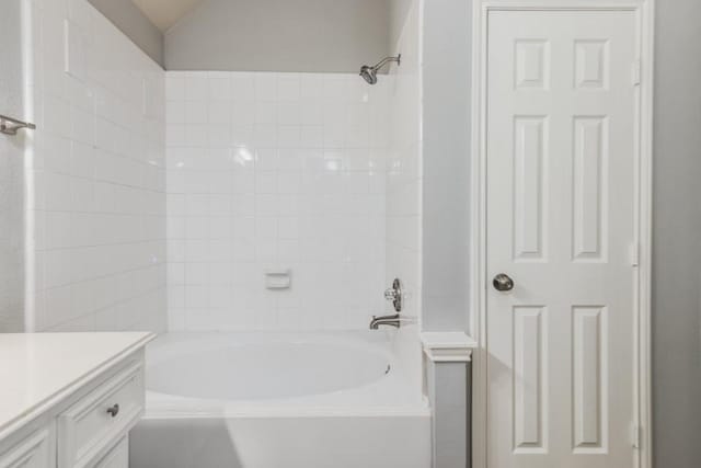 bathroom featuring vanity and bathtub / shower combination