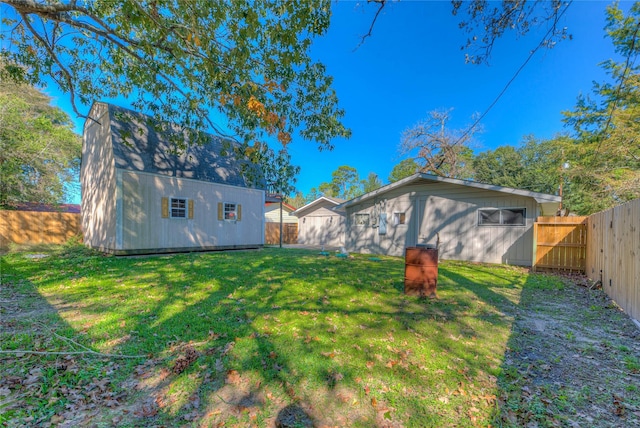 exterior space featuring an outdoor structure and a lawn