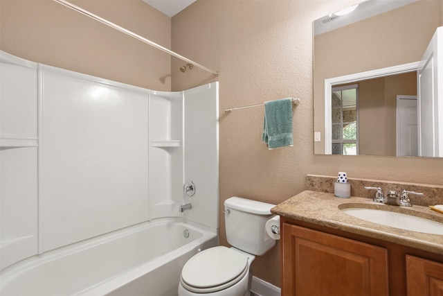 full bathroom featuring vanity, shower / bath combination, and toilet