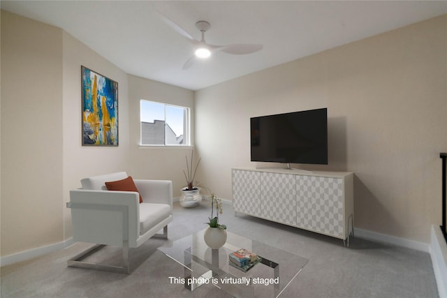 carpeted living room featuring ceiling fan