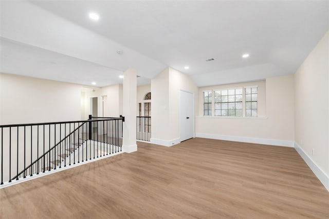 spare room with light hardwood / wood-style flooring