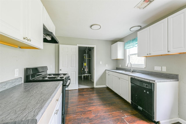 kitchen featuring white cabinetry, dark wood-type flooring, black appliances, and ventilation hood