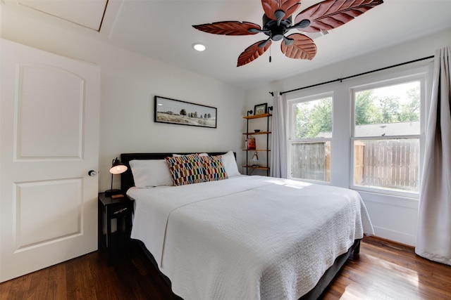 bedroom featuring wood-type flooring and ceiling fan