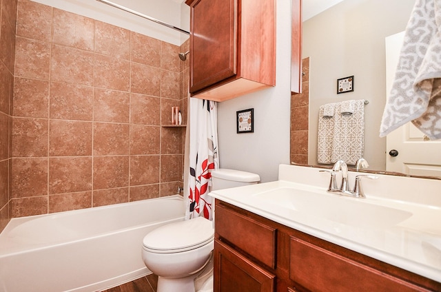 full bathroom featuring shower / bath combination with curtain, vanity, toilet, and hardwood / wood-style floors