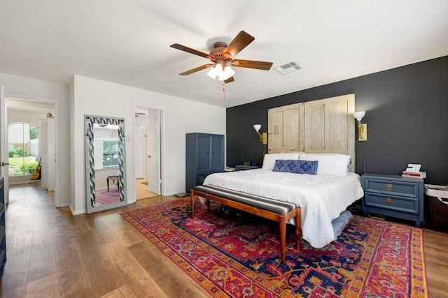 bedroom featuring ceiling fan and light wood-type flooring