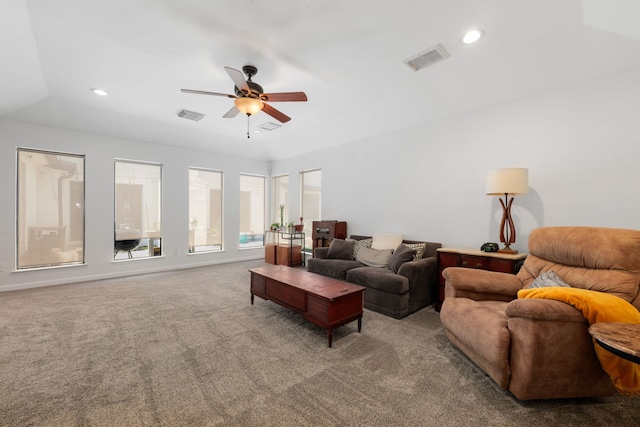 carpeted living room with ceiling fan