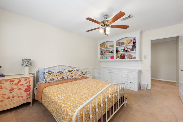 bedroom featuring ceiling fan and light colored carpet