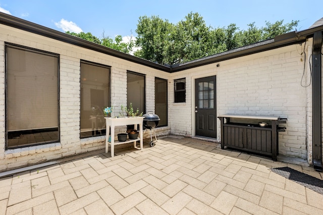 view of patio featuring a grill