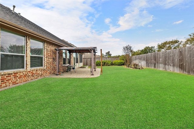 view of yard featuring a pergola and a patio