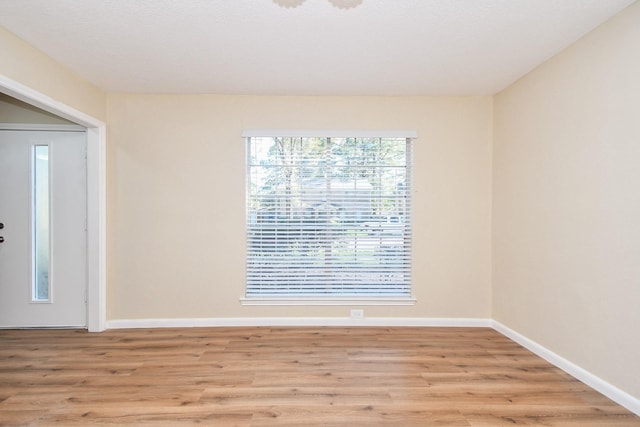 foyer with light wood-type flooring