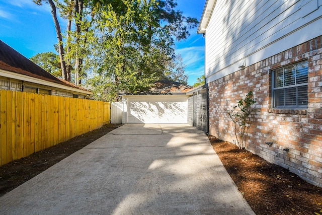 view of property exterior with a garage