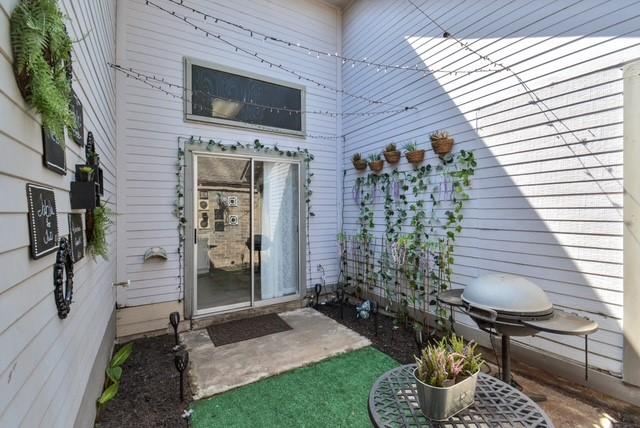 entrance to property featuring a patio