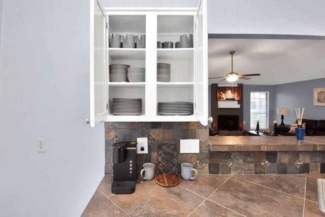 kitchen featuring ceiling fan