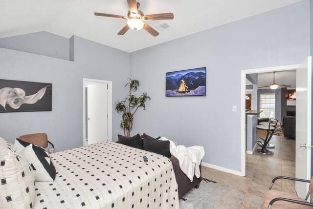 bedroom with ceiling fan and lofted ceiling