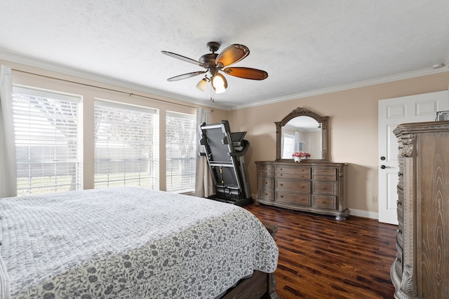 bedroom featuring ceiling fan, dark wood-type flooring, a textured ceiling, and ornamental molding