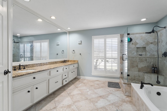 bathroom featuring tile patterned floors, vanity, and plus walk in shower