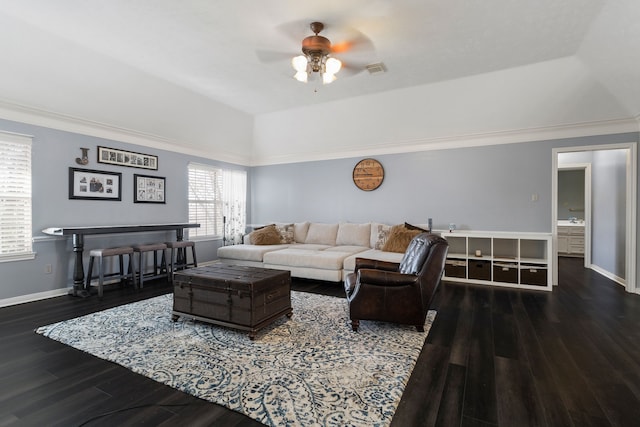 living room with plenty of natural light, dark hardwood / wood-style floors, and ceiling fan