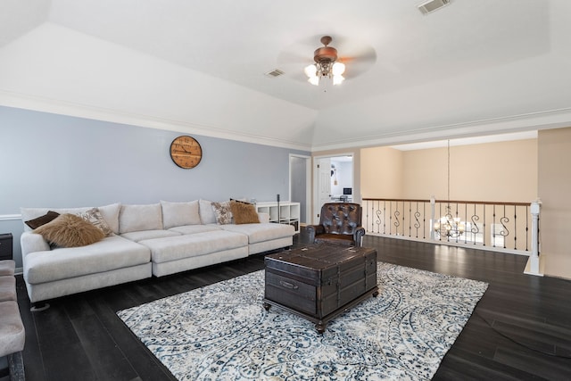 living room featuring ceiling fan with notable chandelier, dark hardwood / wood-style floors, and lofted ceiling