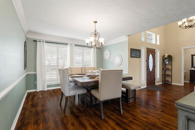 dining area featuring an inviting chandelier, dark wood-type flooring, and crown molding