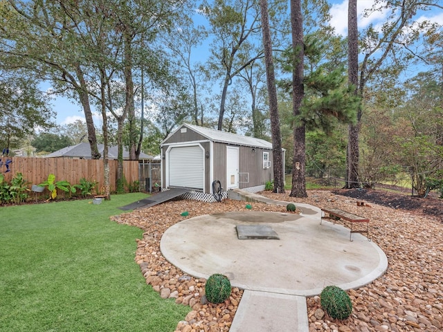 view of yard with an outdoor structure and a patio area