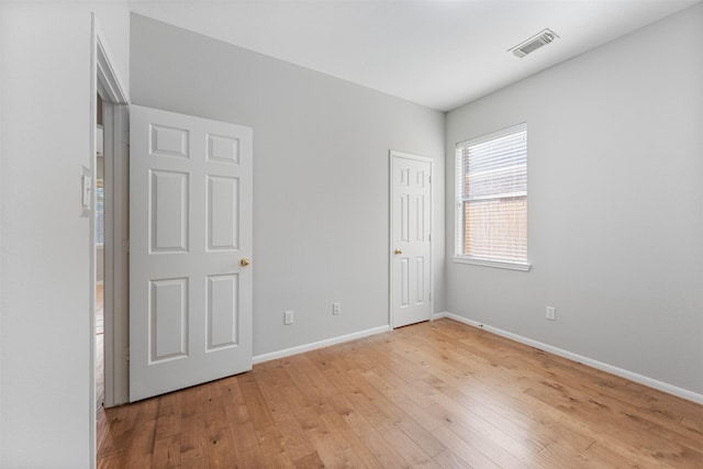 unfurnished bedroom featuring light hardwood / wood-style flooring