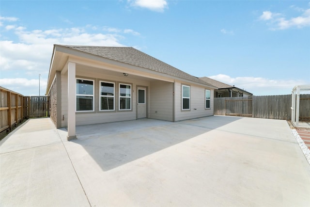 back of property with a patio area