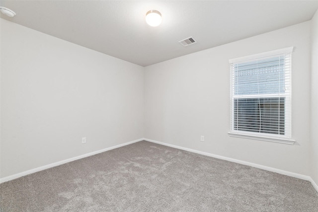 unfurnished room with carpet