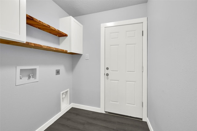 laundry room with cabinets, hookup for an electric dryer, dark hardwood / wood-style flooring, hookup for a washing machine, and a textured ceiling