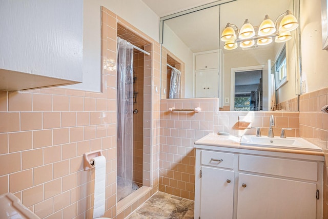 bathroom with vanity, tile walls, and a shower with shower curtain