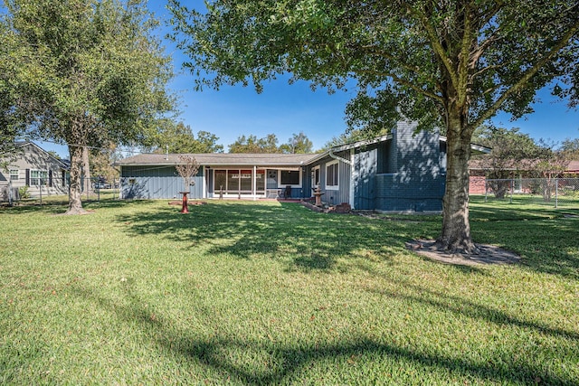 exterior space with a front lawn