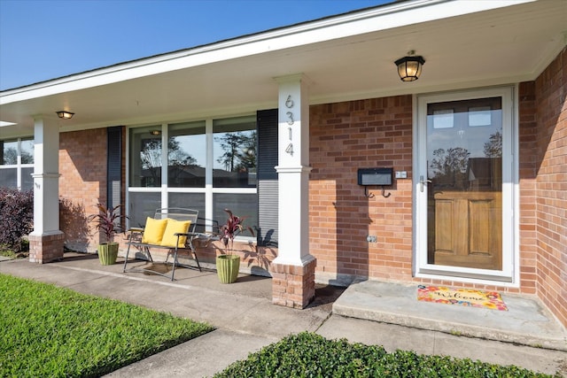 entrance to property with a porch