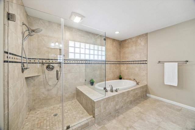 bathroom with independent shower and bath