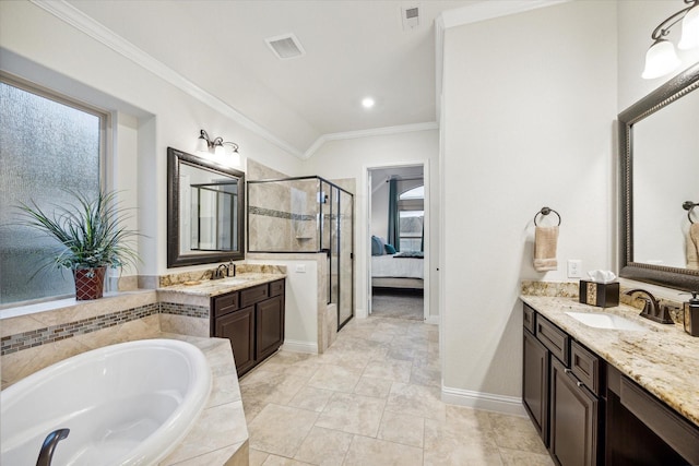 bathroom with vanity, shower with separate bathtub, and ornamental molding