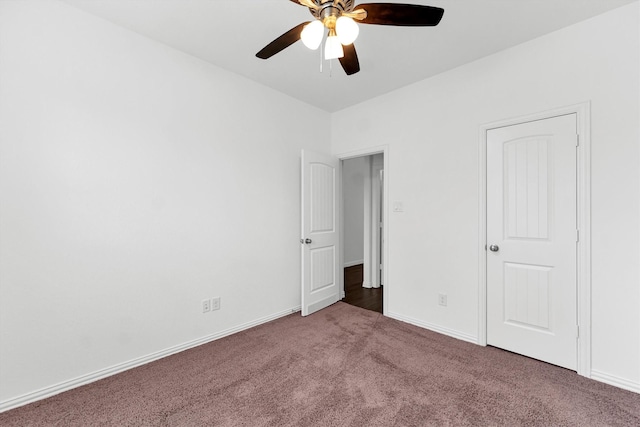 unfurnished bedroom with carpet flooring and ceiling fan