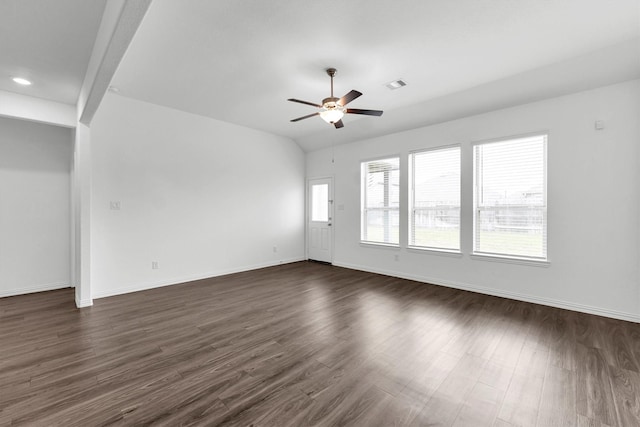 empty room featuring ceiling fan and dark wood-type flooring