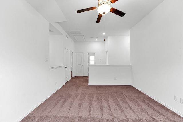 spare room with carpet and ceiling fan