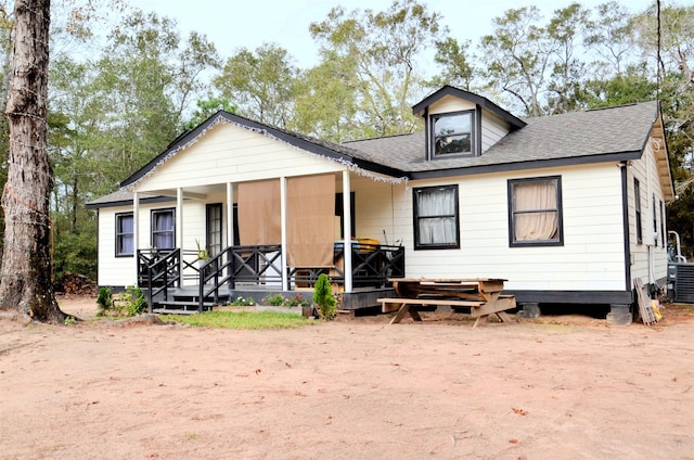 back of house with covered porch