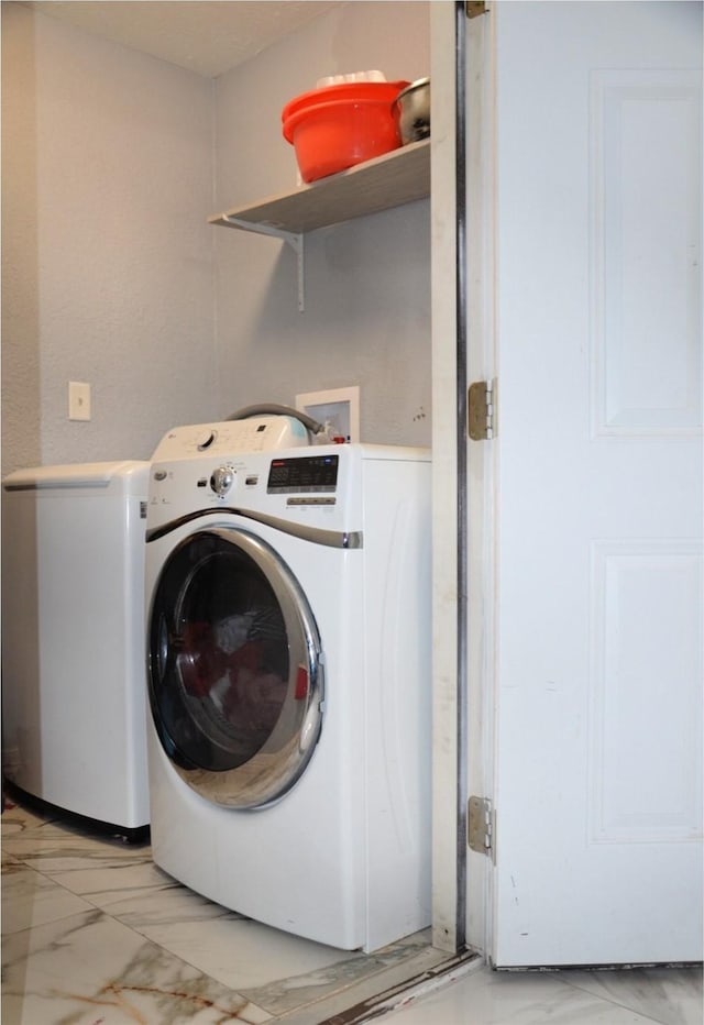 laundry area featuring washer / clothes dryer