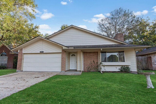 ranch-style home with a front lawn and a garage