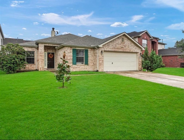 view of front facade featuring a front yard and a garage