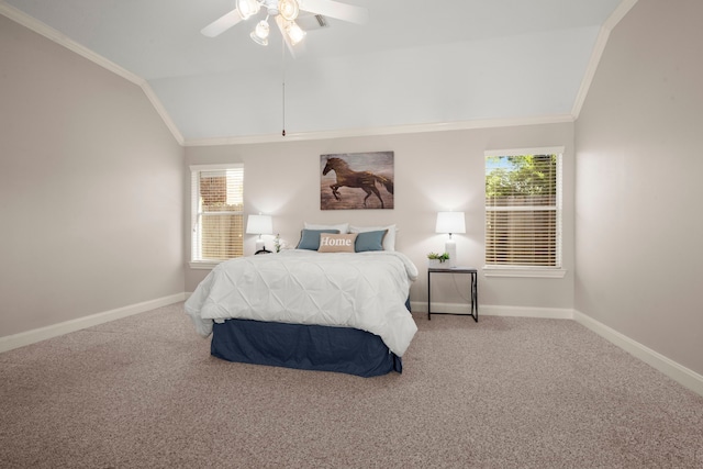 carpeted bedroom featuring ceiling fan, lofted ceiling, and ornamental molding