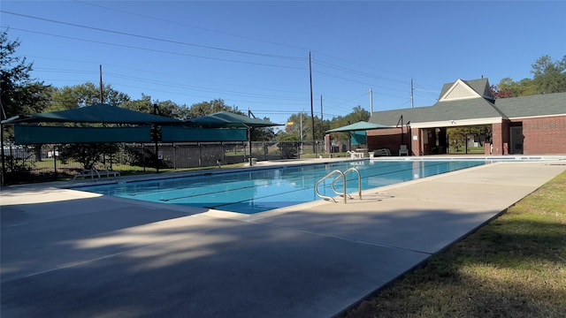 view of pool featuring a patio